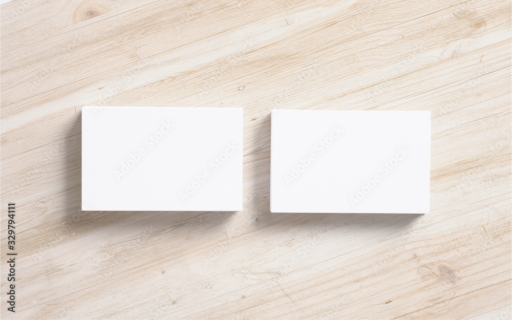 Black business cards stacks on wooden background. Template to showcase your presentation. Black business cards stacks on wooden background. Template to showcase your presentation.