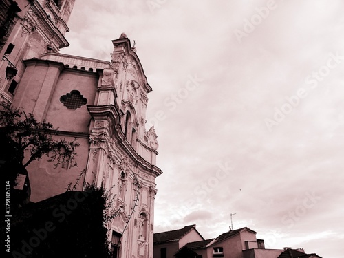 Cervo Ligure, Italy - 02/15/2020: Travelling around the Riviera Ligure in winter days. Beautiful photography of the small vilagges near the sea with typical old buildings. photo