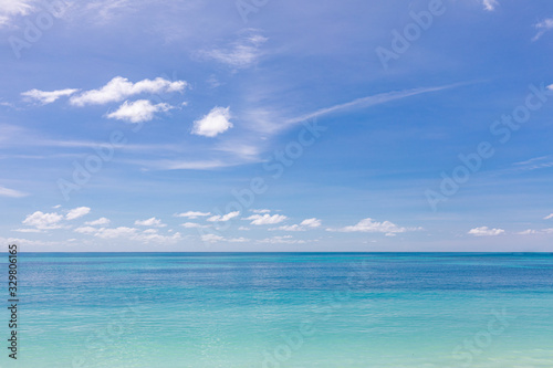 Relaxing seascape with wide horizon of the sky and the sea. Calm ocean water