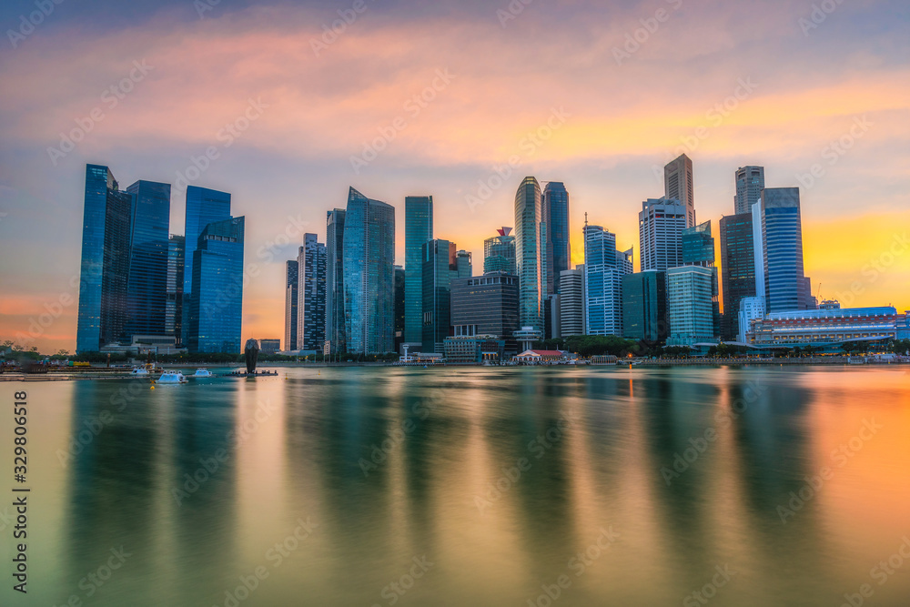 Panorama view of Singapore cityscape and skyscrapers at Marina Bay with sunset sky background, Singapore city, Singapore.
