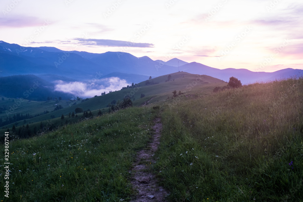 Obraz premium Majestic sunset in the mountains landscape. Nature summer landscape