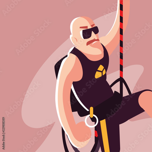 man rock climber with climbing equipment