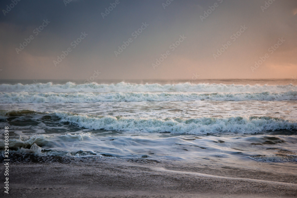 green ocean with soft sunrise