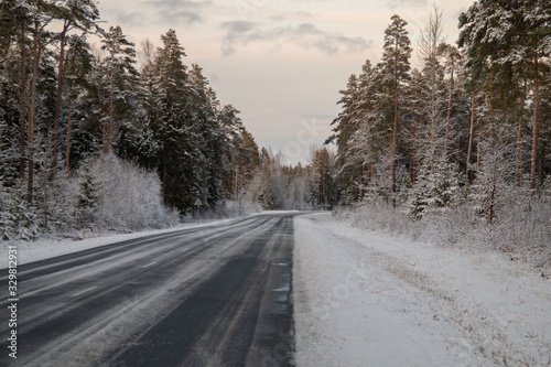 Winter road in snowy winter day