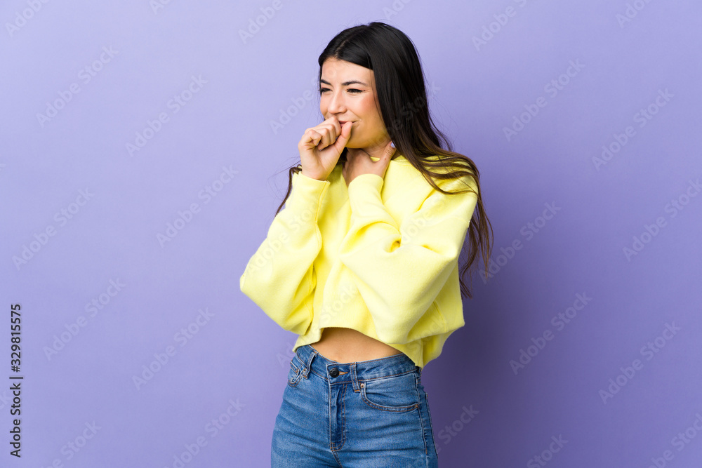 Young brunette woman over isolated purple background coughing a lot Young brunette woman over isolated purple background coughing a lot