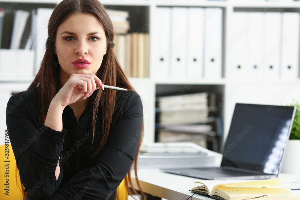 Beautiful smiling girl at workplace hold silver pen looking in camera. White collar worker at workspace modern lifestyle client offer startup project irs audit student study creative discussion