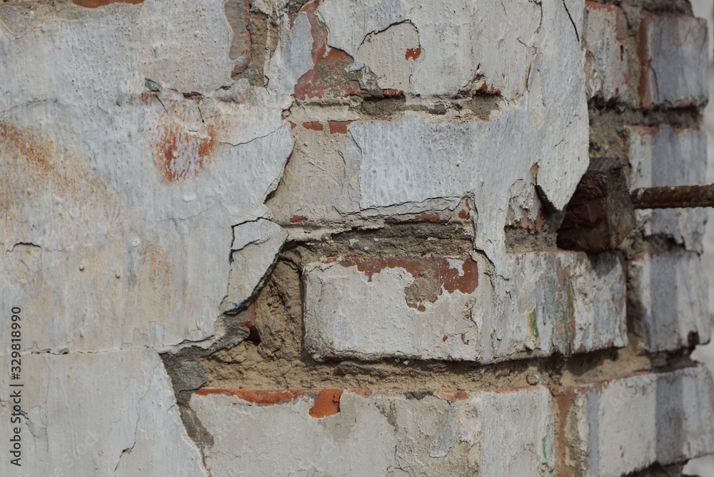 gray stone texture of old bricks and plaster in the wall gray stone texture of old bricks and plaster in the wall