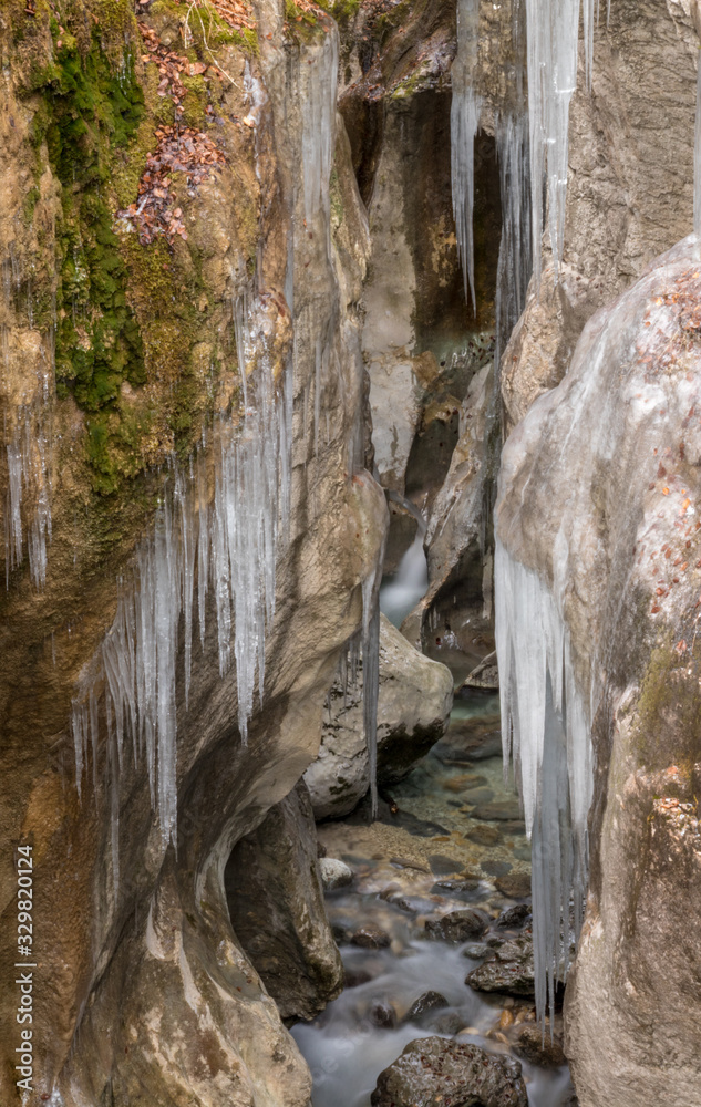 Narrow canyon Mostnica covered in icicle, Bohinj