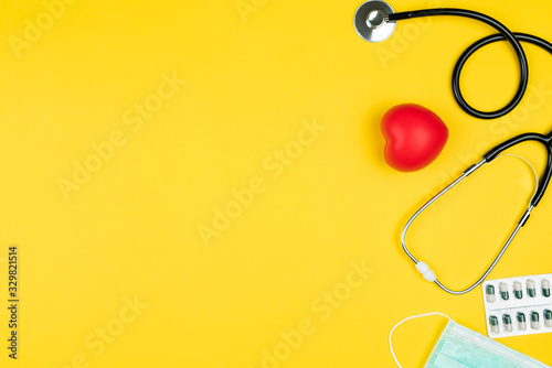 World health day concept Healthcare medical insurance with red heart, stethoscope, mask and medicine