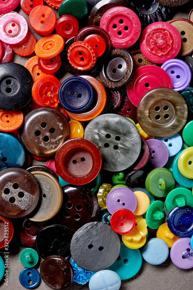 Background and texture of multicolored antique buttons Background and texture of multicolored antique buttons