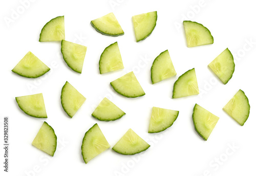 Cucumber quarter slices on white background.