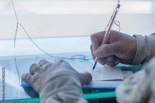 Closeup sigining paperwork photo