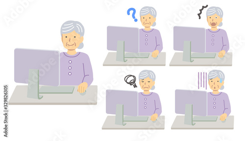 パソコンを使う紫の服を着たシニア女性セット