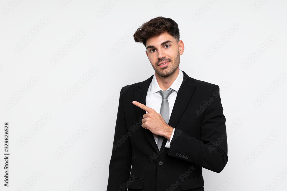 Young businessman over isolated white background pointing finger to the side Young businessman over isolated white background pointing finger to the side
