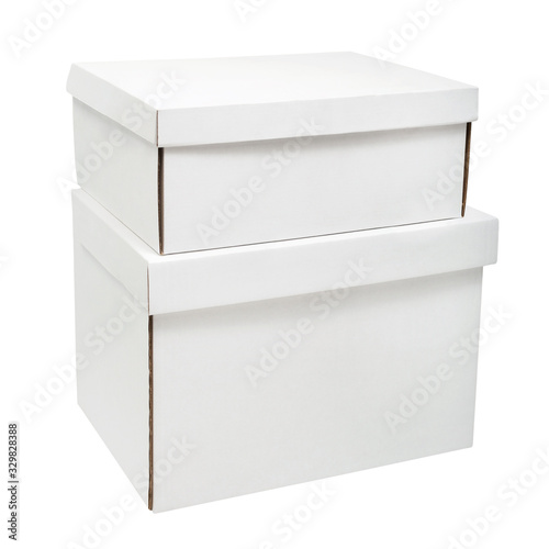 Two blank white corrugated cardboard boxes isolated on white background