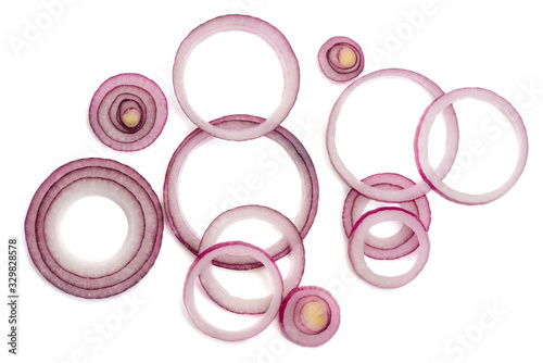 Ring slices of red onion on white background