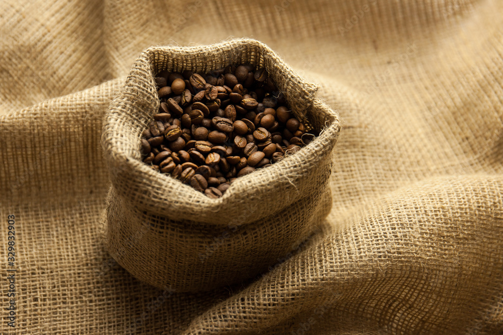 Burlap hessian sack of roasted coffee beans Burlap hessian sack of roasted coffee beans