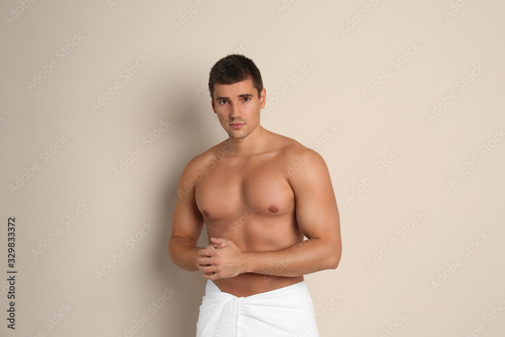 Man with sexy body on beige background Man with sexy body on beige background