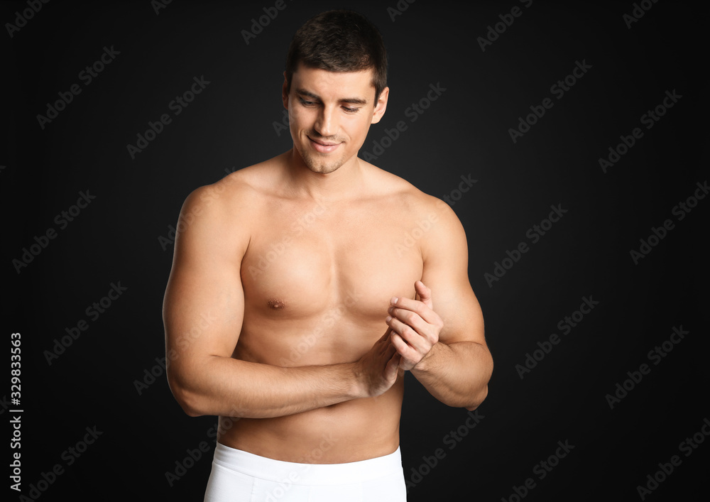 Man with sexy body on grey background. Space for text