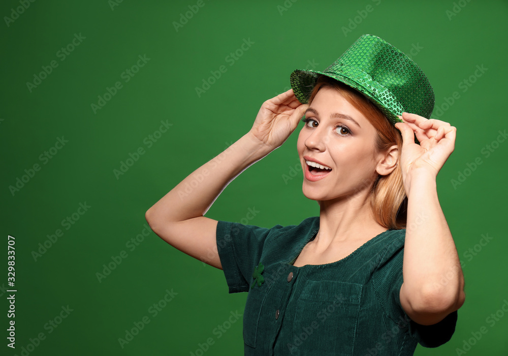 Young woman in green outfit on color background. St. Patrick's Day celebration Young woman in green outfit on color background. St. Patrick's Day celebration