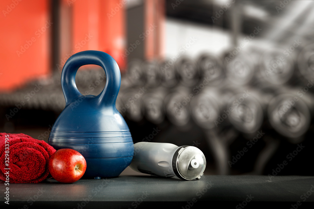 Fototapeta premium Dark interior of gym and dumbbells.Free space for your decoration and healthy life