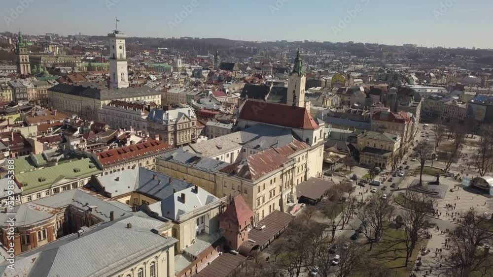 Aerial view to Central City Hall in the tourist and historical center of Lviv city, Ukraine Aerial view to Central City Hall in the tourist and historical center of Lviv city, Ukraine