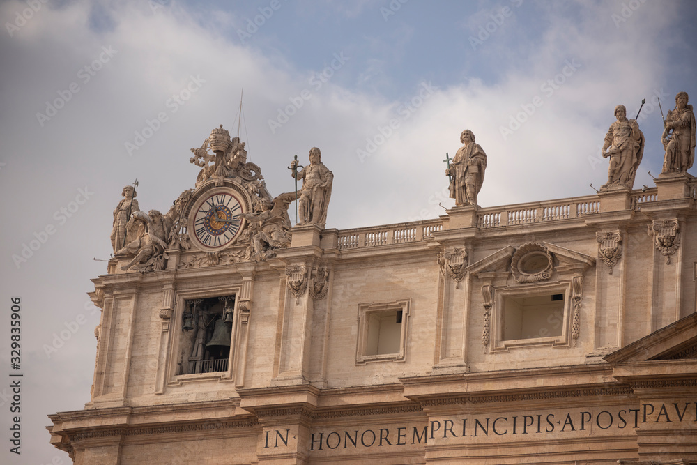 Detail of the facade with statues of St. Peter's Basilica, Rome, Italy. One of the largest buildings in the world from the 1600s
