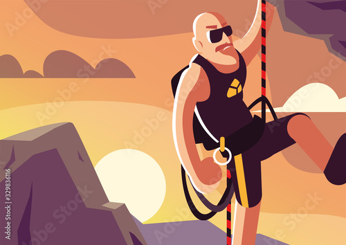 man rock climbing the mountain
