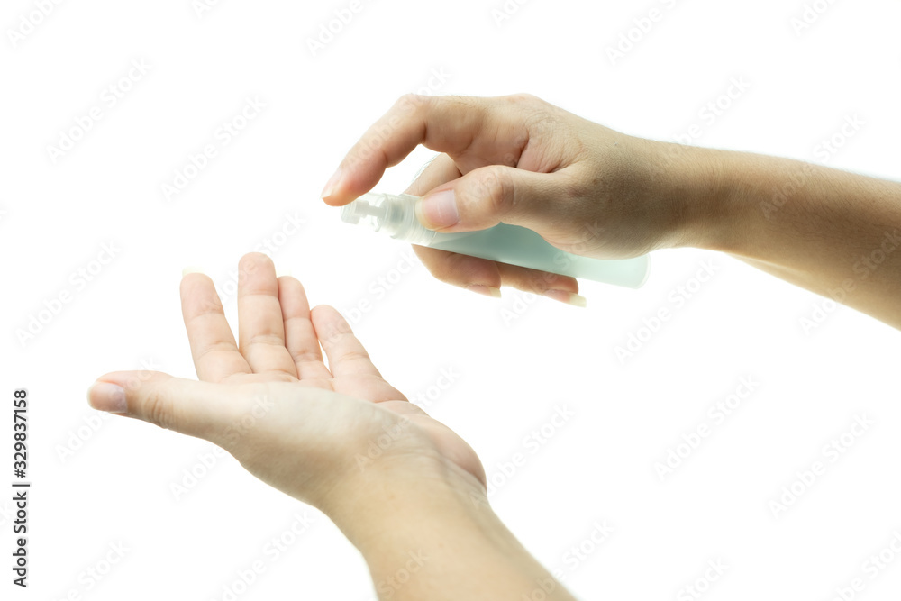 Hand of woman that applying alcohol spray from the plastic bottle or anti bacteria to prevent the spread of germs at white background Hand of woman that applying alcohol spray from the plastic bottle or anti bacteria to prevent the spread of germs at white background