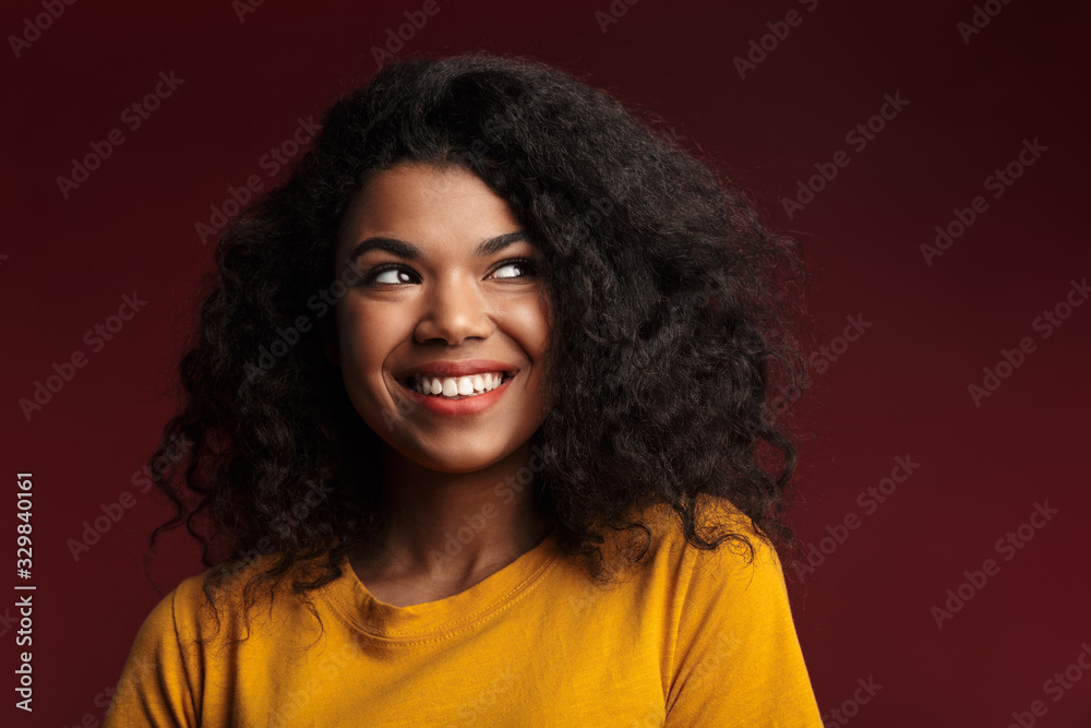 Image of beautiful brunette african american woman with curly hair smiling Image of beautiful brunette african american woman with curly hair smiling
