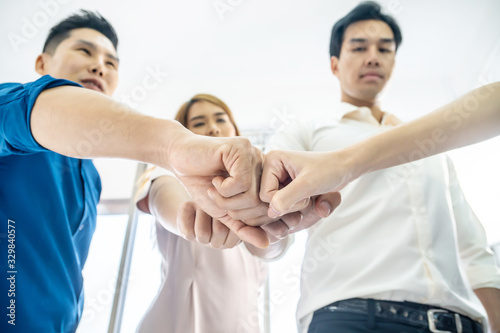 Teamwork business join hand together concept, Image of hands in circle as symbol of their partnership and teamwork,we will do the best concept, People joining for cooperation success business.