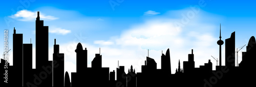 City skyline on blue sky background. Abstract city against the blue sky and white clouds. City  sky  clouds