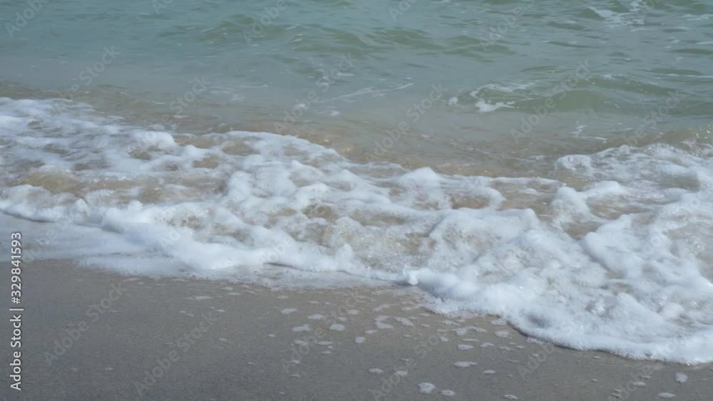 Coastline. Small waves roll ashore. Coastline. Small waves roll ashore.