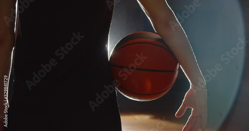 Close-up basketball ball player darkness shadow silhouette gym