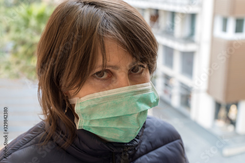 Woman wearing medical face mask for protection