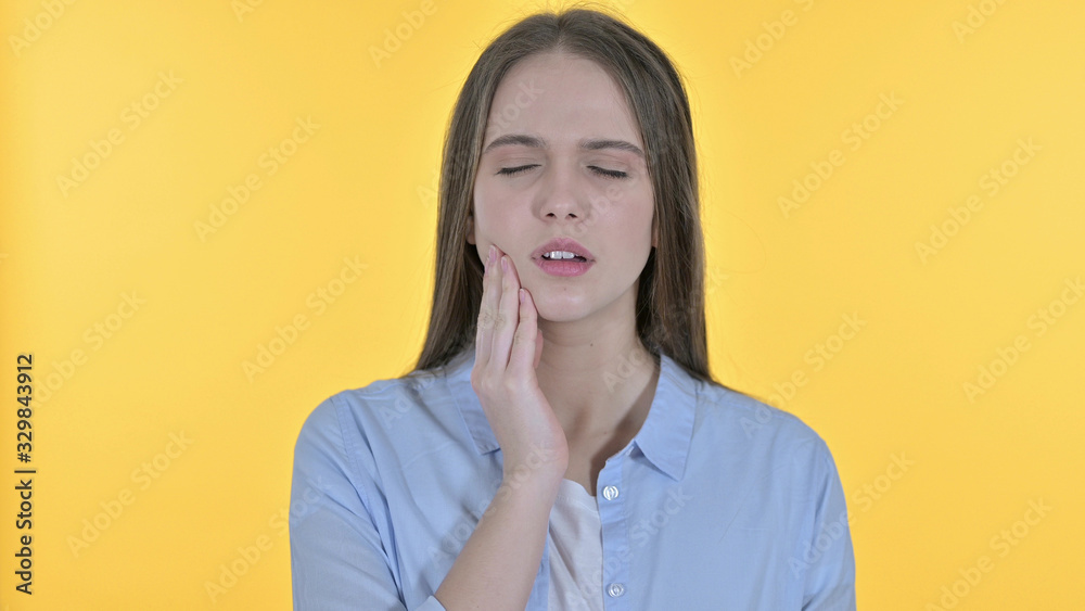 Sick Casual Young Woman having Toothache, Yellow Background Sick Casual Young Woman having Toothache, Yellow Background