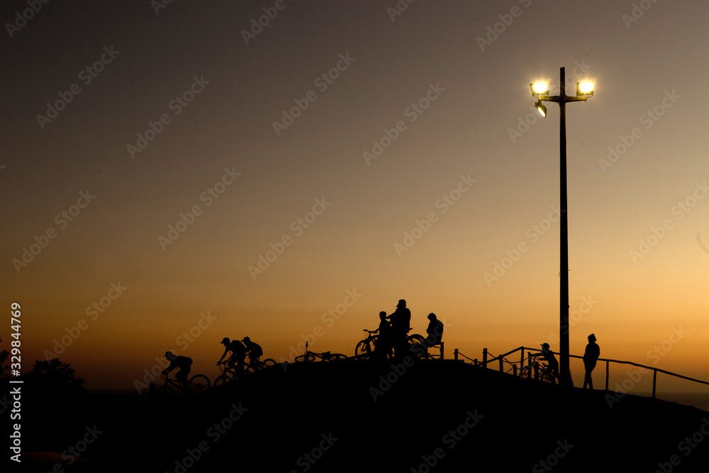 Sunset coast Miraflores Lima Peru. Playgrond silhouettes