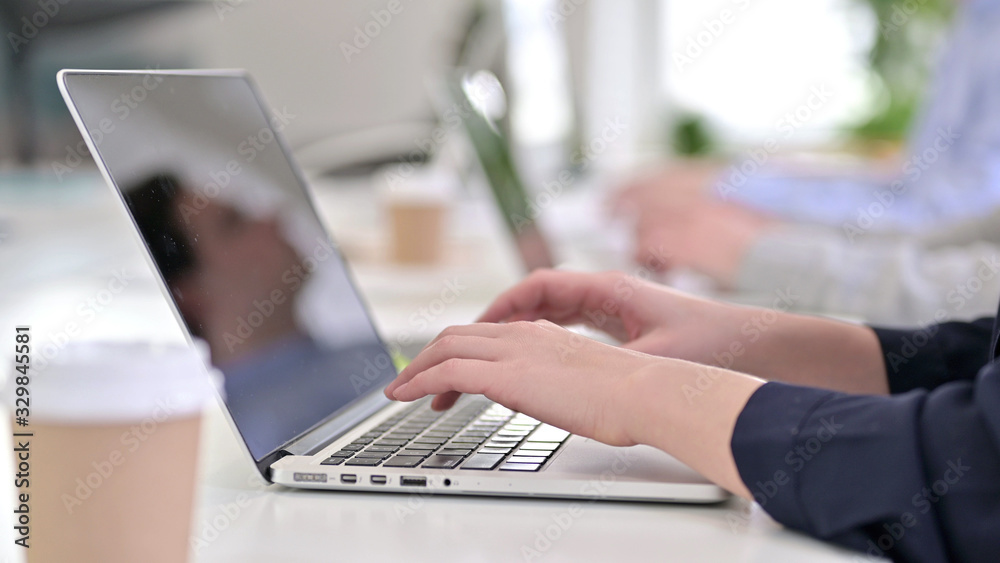 Close Up of Young Woman Working Laptops in Office Close Up of Young Woman Working Laptops in Office