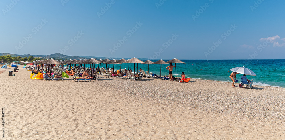 Halkidiki, Greece - September 05,2019: Porto Beach near Pefkochori, Halkidiki, Greece. One of the most beautiful beaches in the Halkidiki Peninsula.