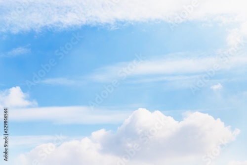 Fototapeta Naklejka Na Ścianę i Meble -  Scenic pale blue sky with beautiful white clouds. Copy space
