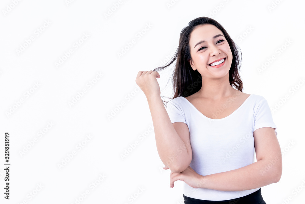 Portrait images of Asian young, pretty woman, She is smiling brightly, She has beautiful white and clean teeth, sparking eyes On white background to people and beauty concept. Portrait images of Asian young, pretty woman, She is smiling brightly, She has beautiful white and clean teeth, sparking eyes On white background to people and beauty concept.