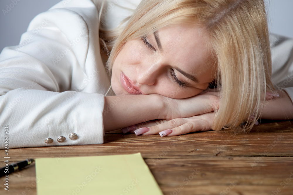 I want to sleep. Young beautiful female manager does not want to work today. She is sleeping at workplace. I want to sleep. Young beautiful female manager does not want to work today. She is sleeping at workplace.