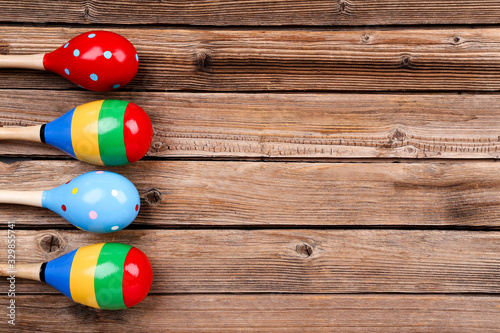 Mexican maracas on brown wooden table