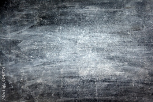 Abstract Chalk rubbed out on blackboard or chalkboard texture. clean school board for background or copy space for add text message. Backdrop of Education concepts.