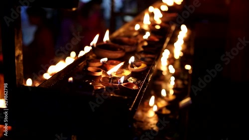 Candles close-up in the Indian Temple on a Religious Festival Diwali. Oil Lamp