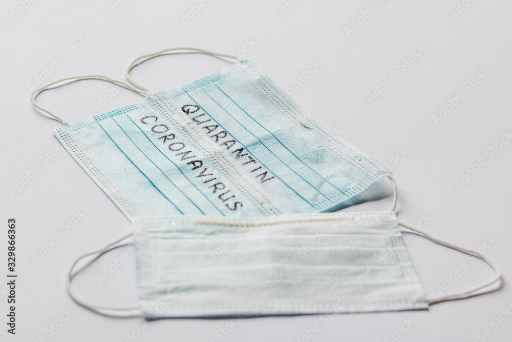 Blue medical face masks with the inscription Blue medical face masks with the inscription