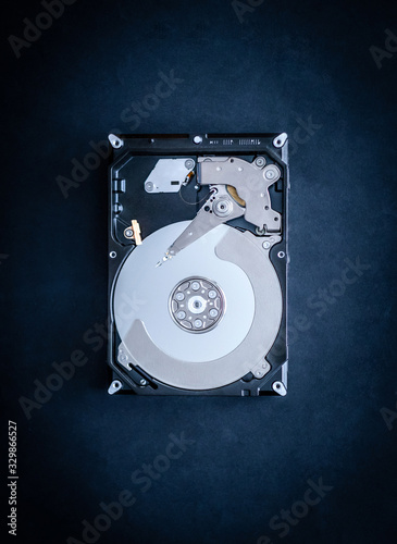 Top view of hard disk drive of personal computer on black table photo