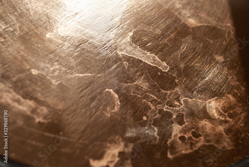 golden glossy background. texture. reflection and stains