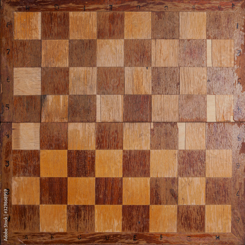 Vintage chessboard made of natural stew