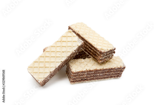 Crispy wafers with creamy hazelnut filling isolated on white background